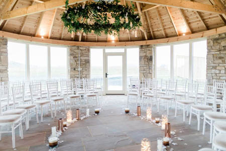 Chairs in a semi-circle with candles