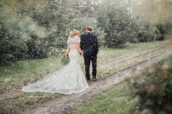 Couple walking in light snow