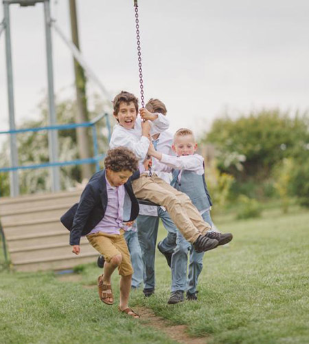 Kids playing on a swing