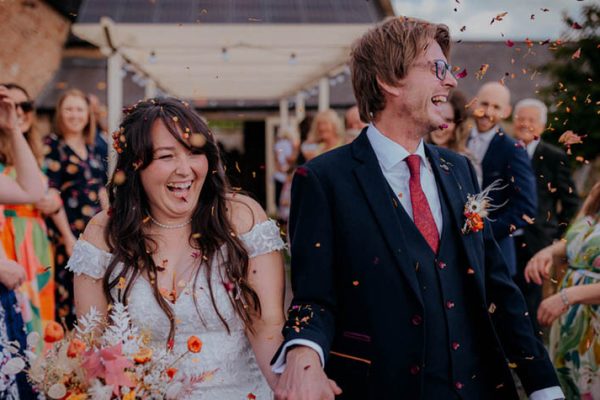 Marie and Adam showered with Confetti