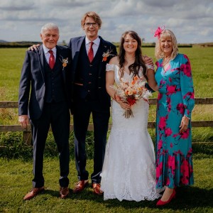 Family photo with countryside backdrop