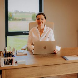 Olivia Lockey at her desk