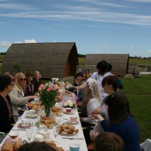 Glamping huts with picnic table