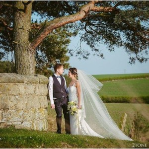 2Tone Photography - Couple by old wall and tree