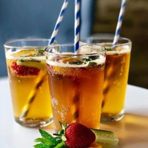 Pimms in glasses with straws
