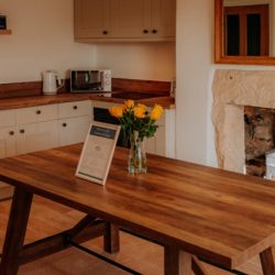 Farm Cottage kitchen table and stove